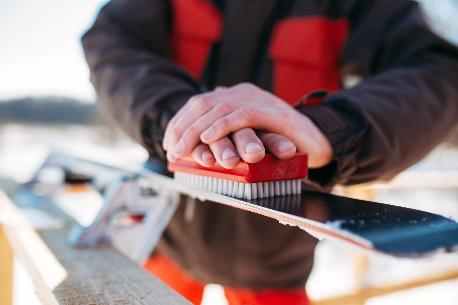 Ski maintenance before the season: checking edges and wax